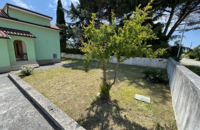 Appartamento con giardino in una posizione attraente a 300 m dal mare - Cittanova